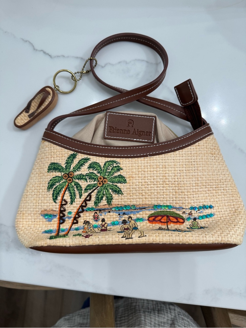 Etienne Aigner Beige Straw Mini shoulder with Brown Trim and Green Embroidery.